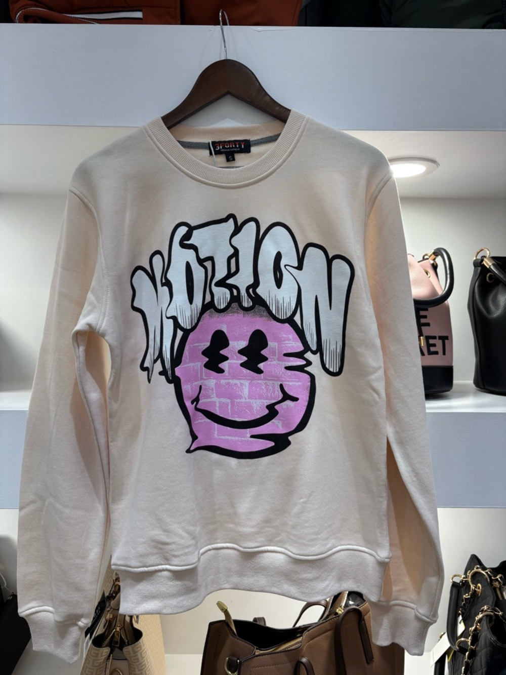 Cream Graphic Crewneck Sweatshirt with Pink Smiley and printed ‘MOTION’